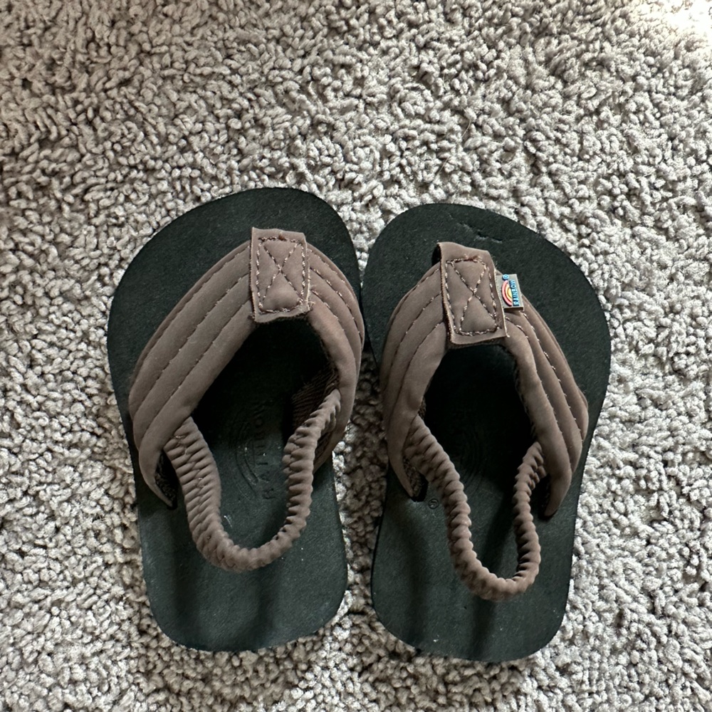 Infant size 3/4 Rainbow flip flops black and brown